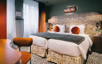 Why are hotel management companies booming in France?
