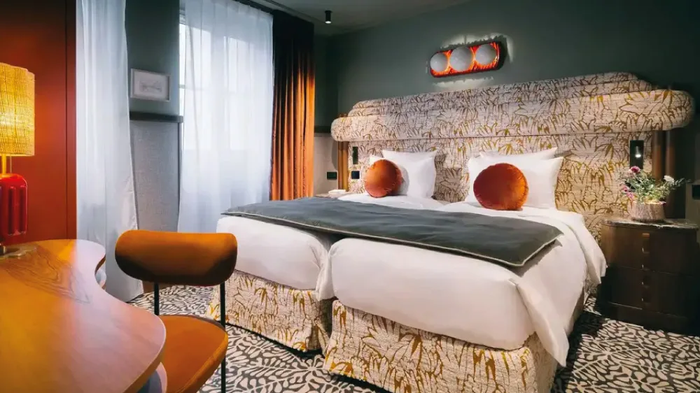 Why are hotel management companies booming in France?